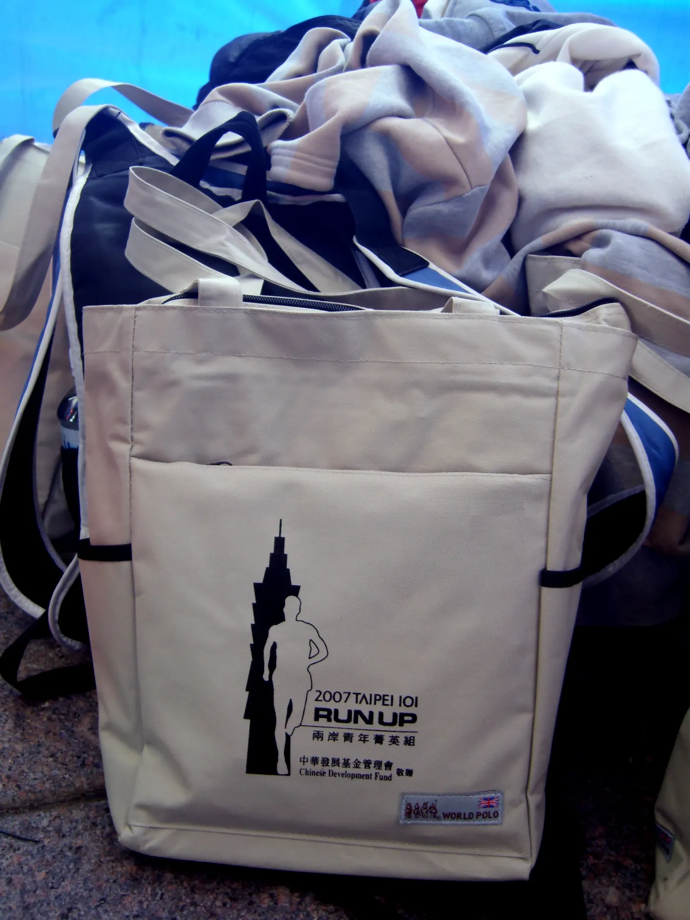 A printed drawstring event tote bag